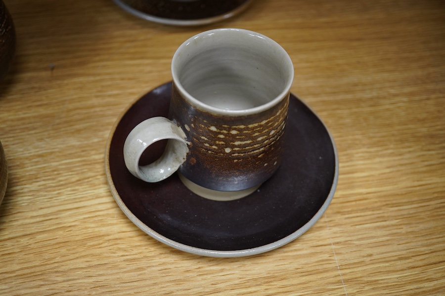 Guy Sydenham (1916-2005), two studio pottery cups and saucers, together with six teacups, incised marks, largest 13.5cm in diameter